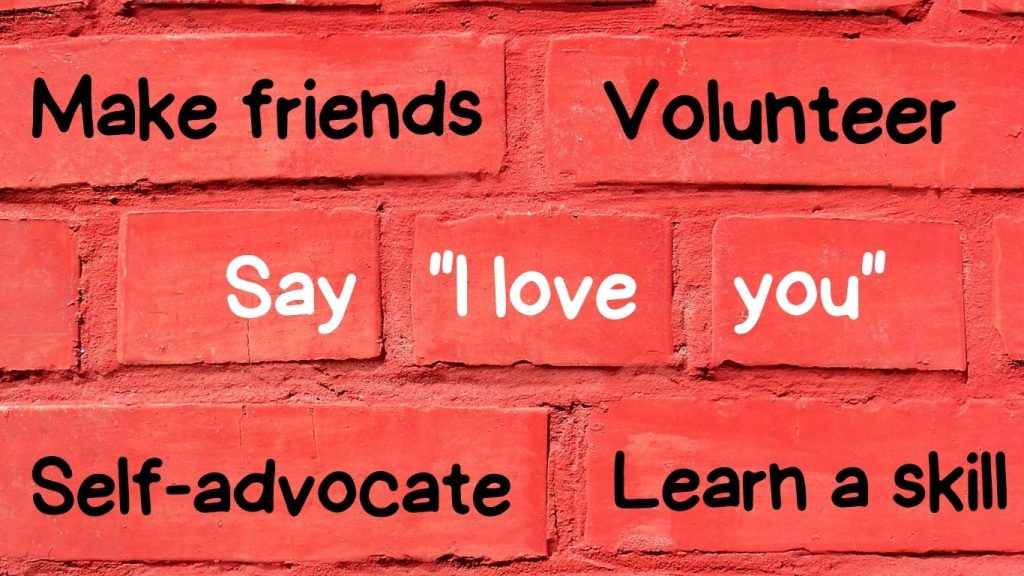A brick wall with samples of building resilience, including: Make friends, Volunteer, Say "I love you", Self-advocate, and Learn a skill. 